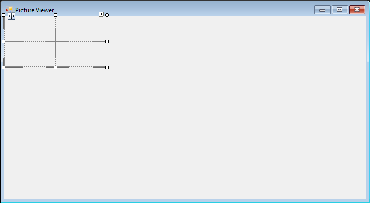 La screenshot mostra il modulo con il controllo TableLayoutPanel aggiunto.